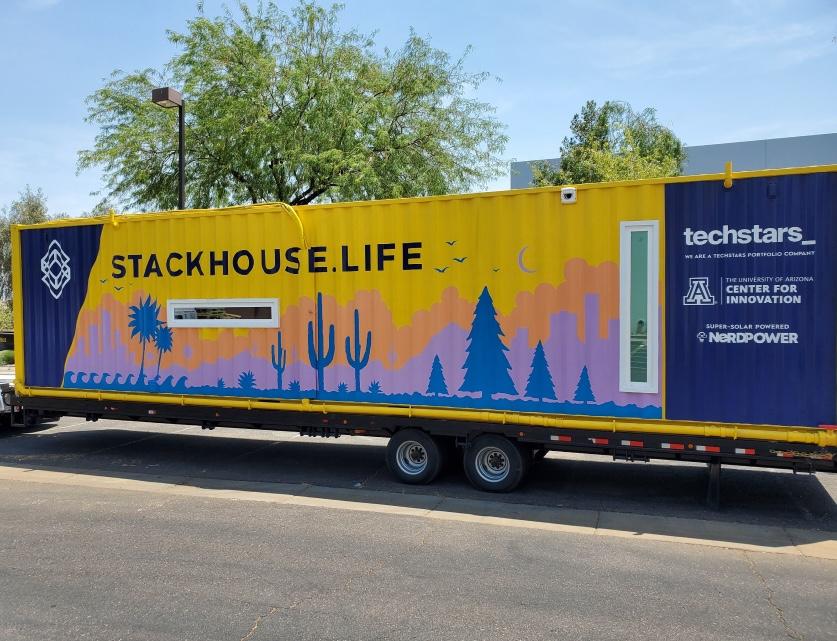 A truck with a stackhouse life sign on it.